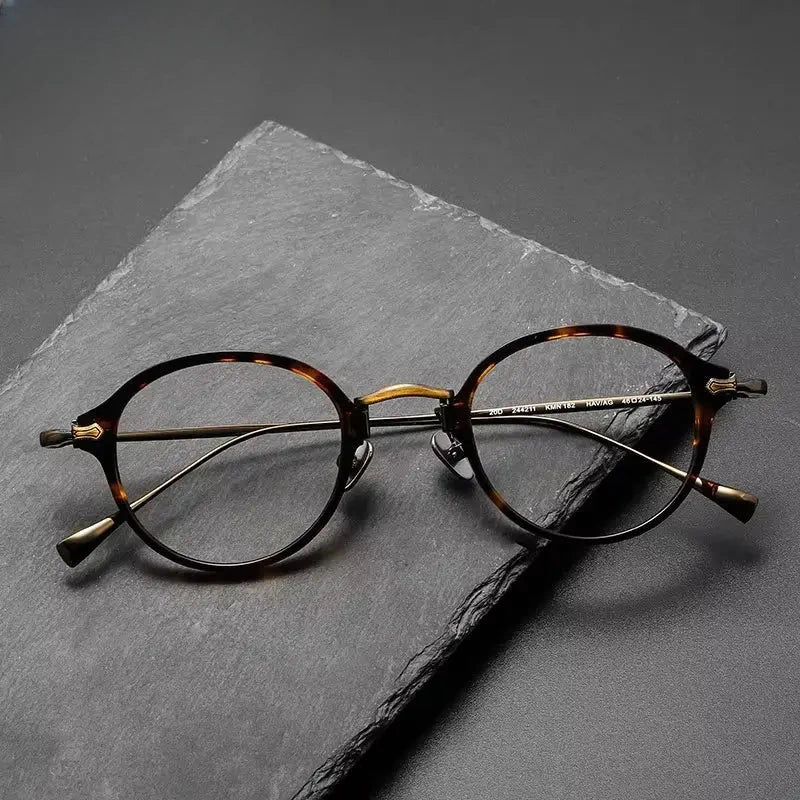 Unisex Round Full Rim Titanium Prescription Glasses 369182 — view 1 | Rx Spectacle