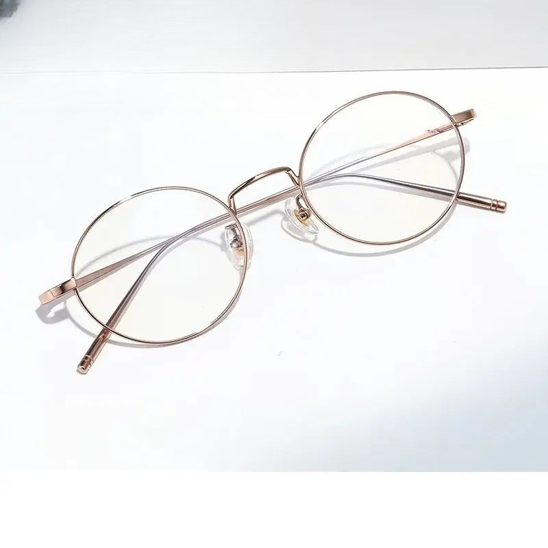 Unisex Oval Full Rim Titanium Prescription Glasses 722467 — view 1 | Rx Spectacle