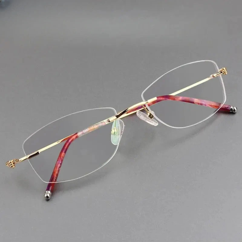 Women's Oval Rimless Titanium Prescription Glasses 678587 — view 1 | Rx Spectacle