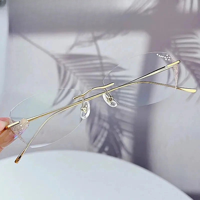Women's Oval Rimless Titanium Prescription Glasses 698989 — view 4 | Rx Spectacle