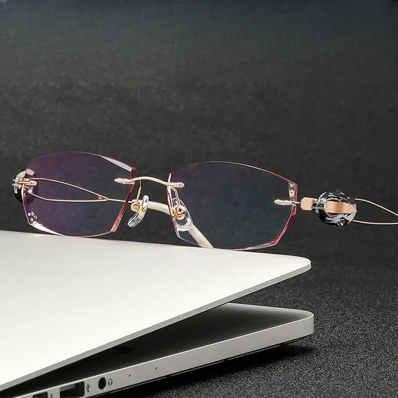Women's Oval Rimless Titanium Prescription Glasses 50221 — view 1 | Rx Spectacle