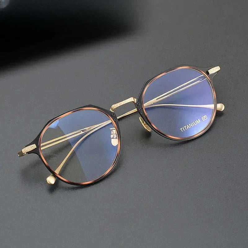 Unisex Oval Full Rim Titanium Prescription Glasses 611061 — view 1 | Rx Spectacle