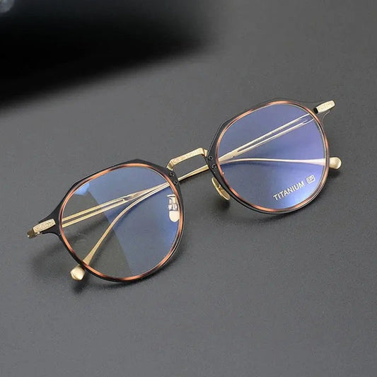 Unisex Oval Full Rim Titanium Prescription Glasses 611061 — view 1 | Rx Spectacle