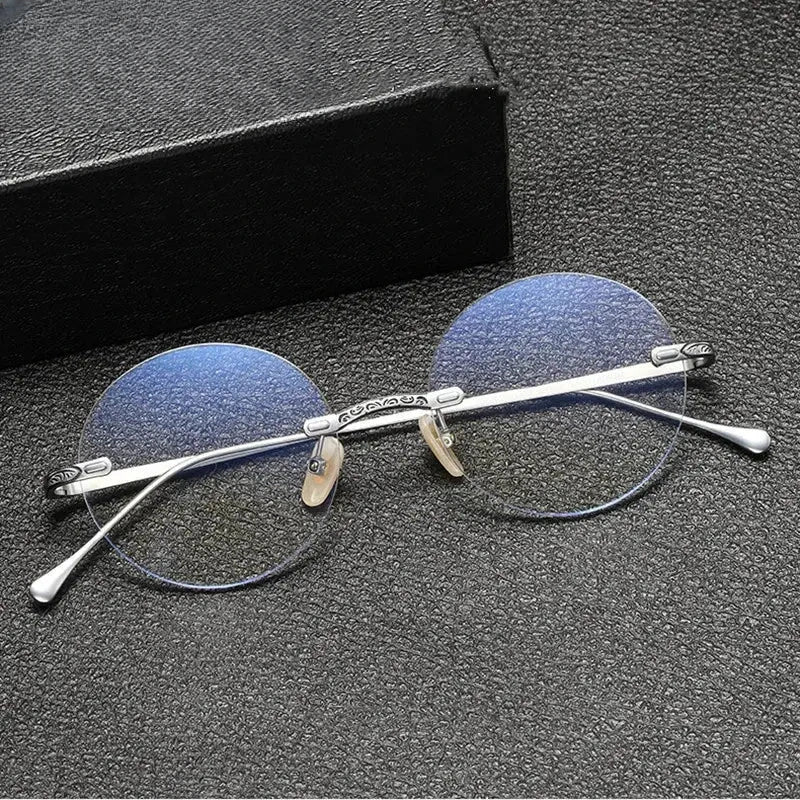 Women's Round Rimless Titanium Prescription Glasses 885933 — view 1 | Rx Spectacle