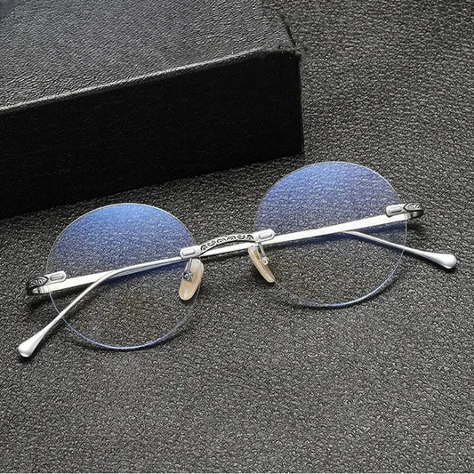 Women's Round Rimless Titanium Prescription Glasses 885933 — view 1 | Rx Spectacle