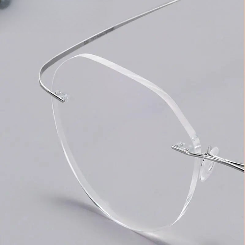 Unisex Round Rimless Titanium Prescription Glasses 8151 — view 5 | Rx Spectacle