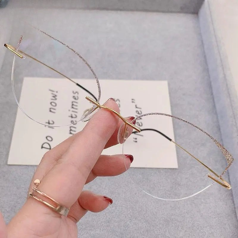 Women's Cat Eye Rimless Titanium Prescription Glasses 16016c — view 1 | Rx Spectacle