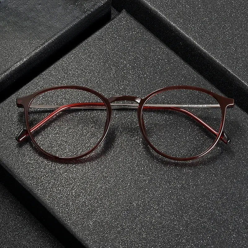 Women's Round Full Rim Titanium Prescription Glasses 72347 — view 1 | Rx Spectacle