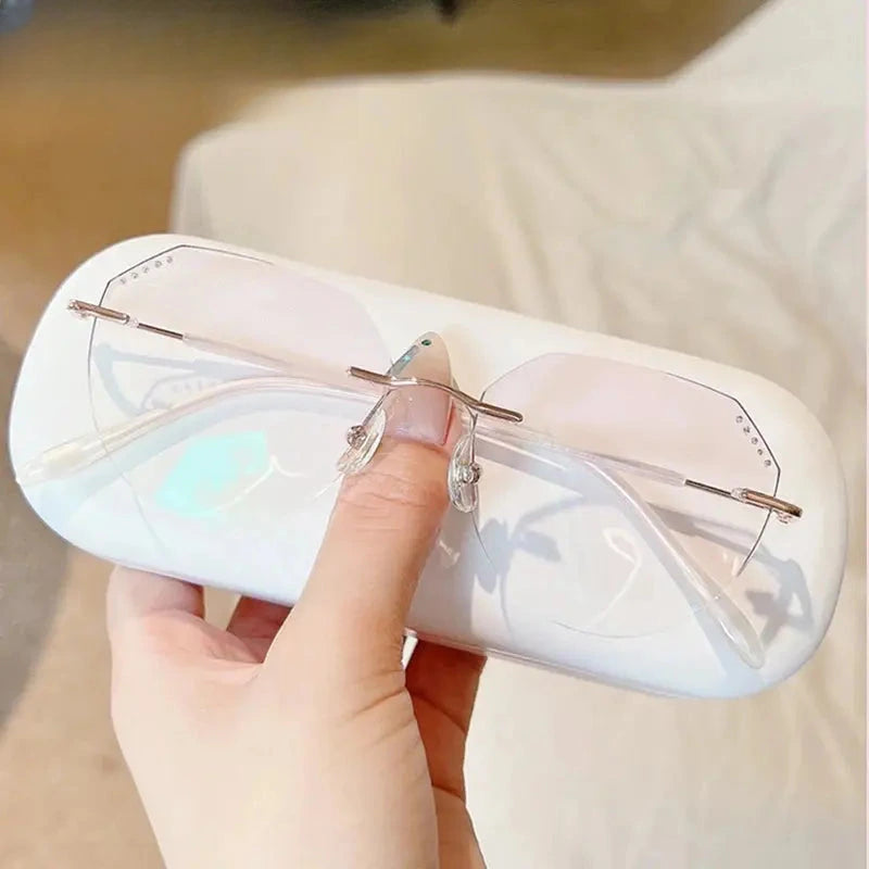 Women's Oval Rimless Titanium Flat Top Prescription Glasses 666085 — view 3 | Rx Spectacle