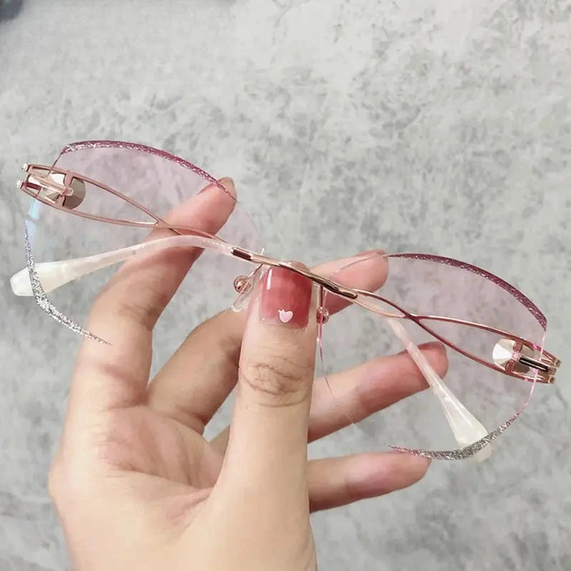 Women's Butterfly Rimless Titanium Prescription Glasses 880224 — view 3 | Rx Spectacle