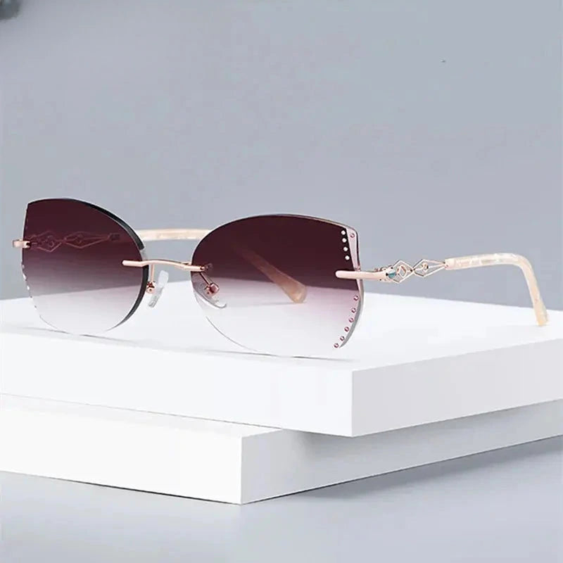 Women's Cat Eye Rimless Titanium Prescription Glasses 58073 — view 1 | Rx Spectacle