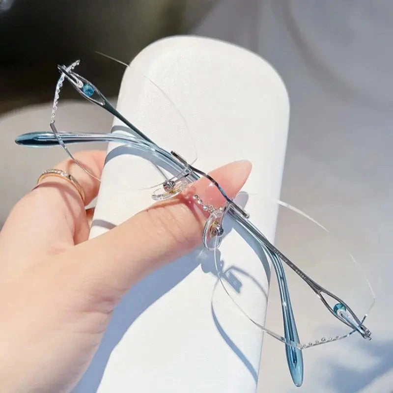 Women's Oval Rimless Titanium Prescription Glasses 698081 — view 3 | Rx Spectacle
