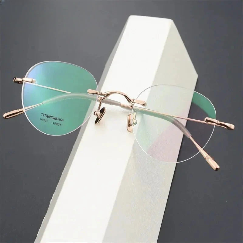 Unisex Round Rimless Titanium Prescription Glasses 2321 — view 2 | Rx Spectacle