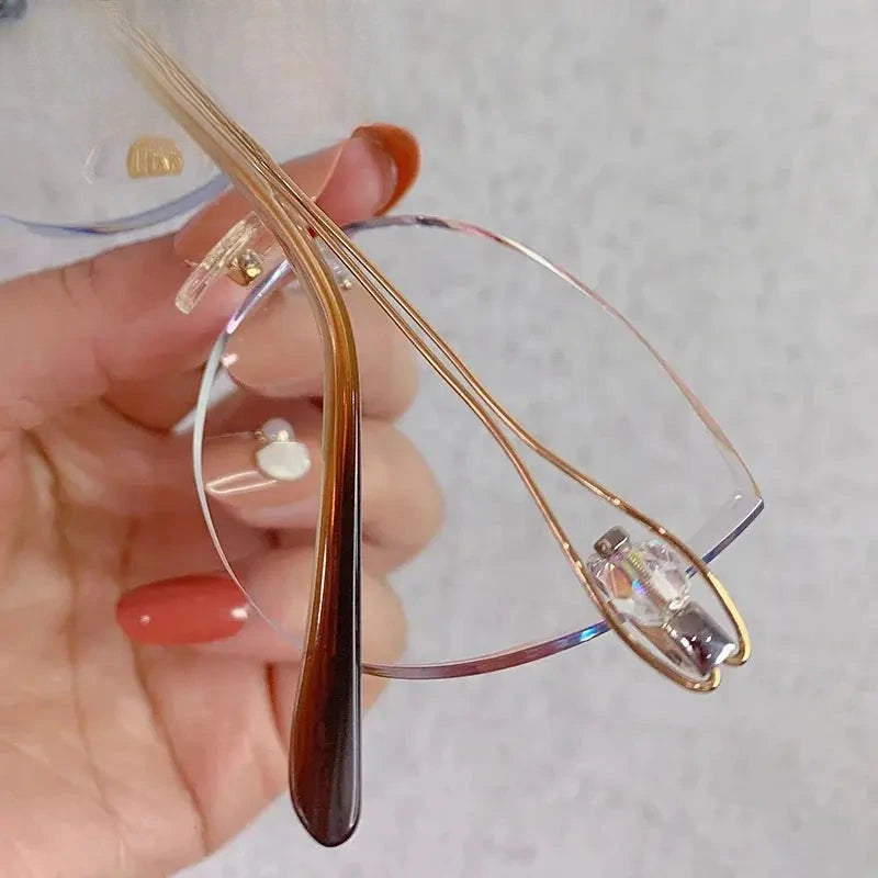 Women's Cat Eye Rimless Titanium Prescription Glasses 1337 — view 3 | Rx Spectacle