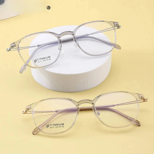 Women's Round Full Rim Titanium Reading Glasses 50131 — view 1 | Rx Spectacle
