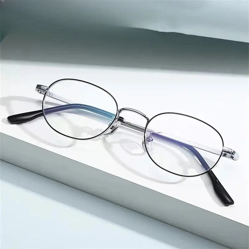 Women's Oval Full Rim Titanium Prescription Glasses 98223 — view 1 | Rx Spectacle