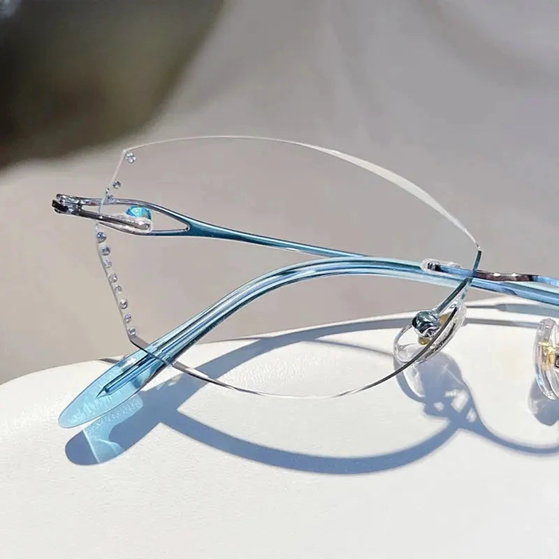 Women's Oval Rimless Titanium Prescription Glasses 698081 — view 1 | Rx Spectacle